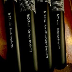 14 brand new still in sleeves makeup brushes from DUcare.